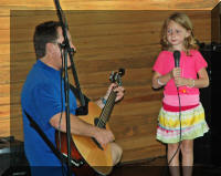 Raeah singing with Dave Kemmerly