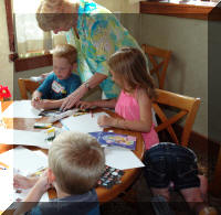 Deb with greats at It's Greek to Me