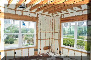 Sprat foam in 4" wall must be shaved using a long, flexible saw